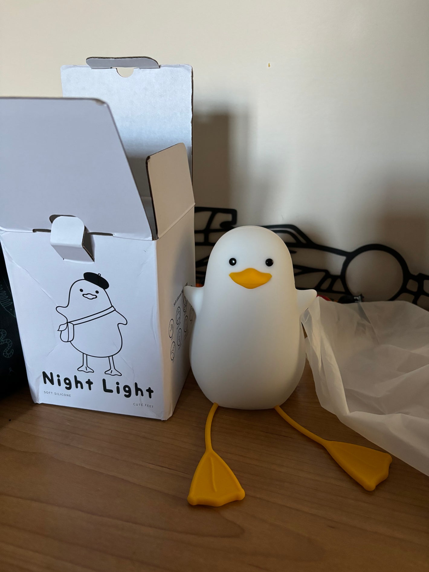 seagull night light sitting on desk with box